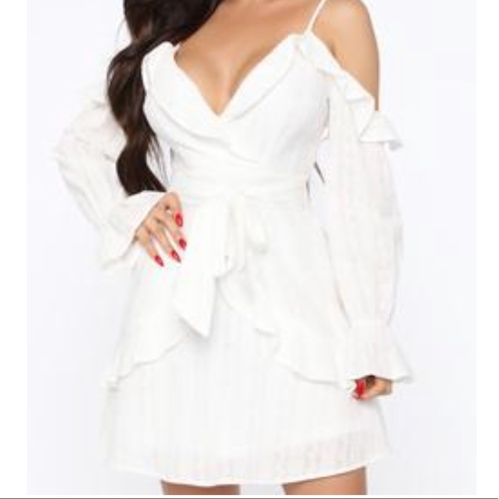 White fashion nova dress. NEVER WORN W/TAGS
